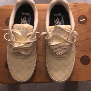 Yellow & White checkered Vans.